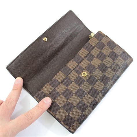 portafoglio donna simile louis vuitton nero lucido|porta foglio louis vuitton.